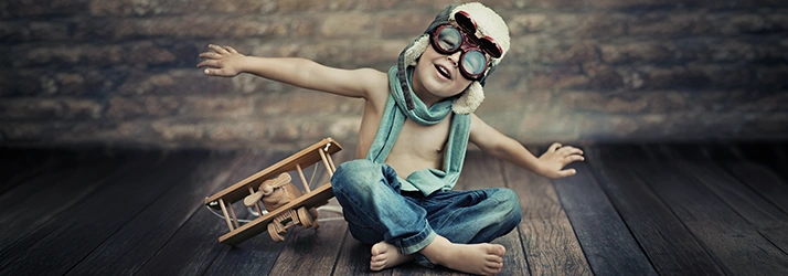 Boy With Toy Airplane